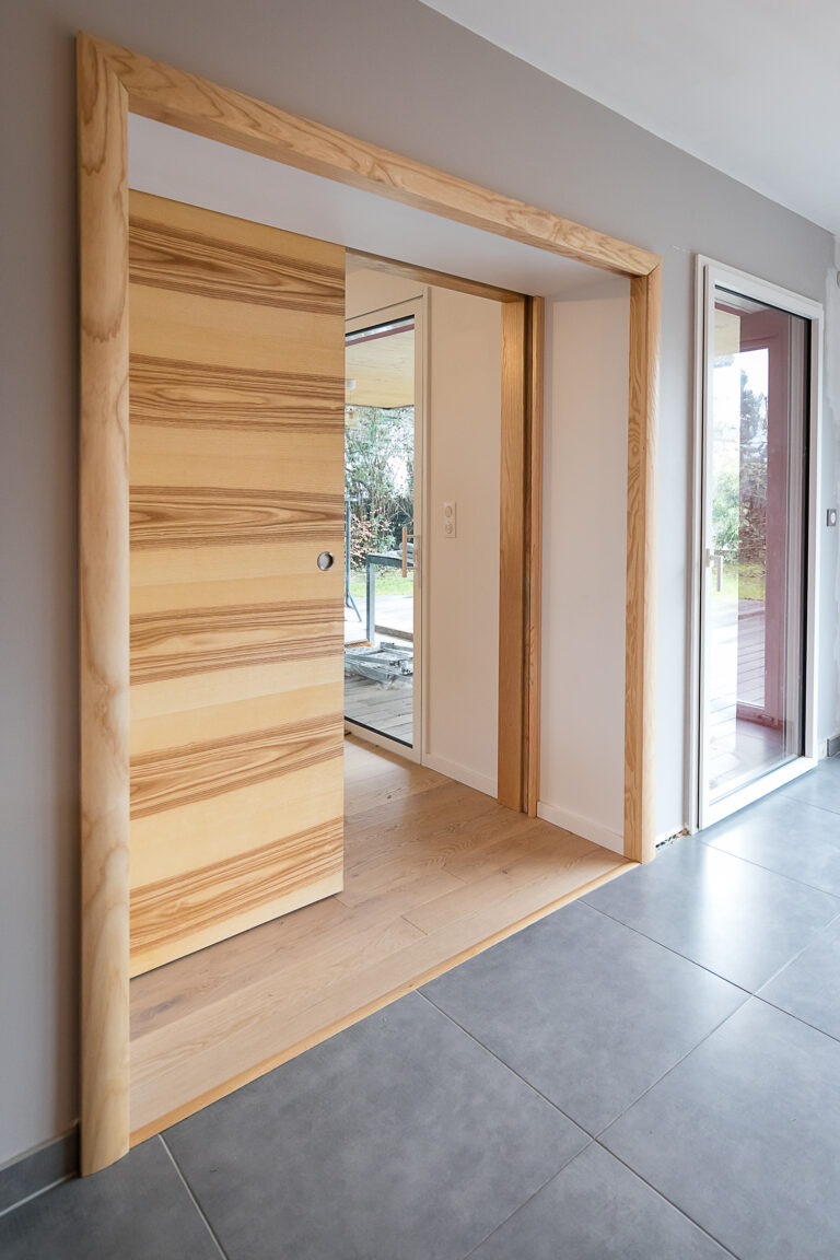 Portes coulissantes en bois massif